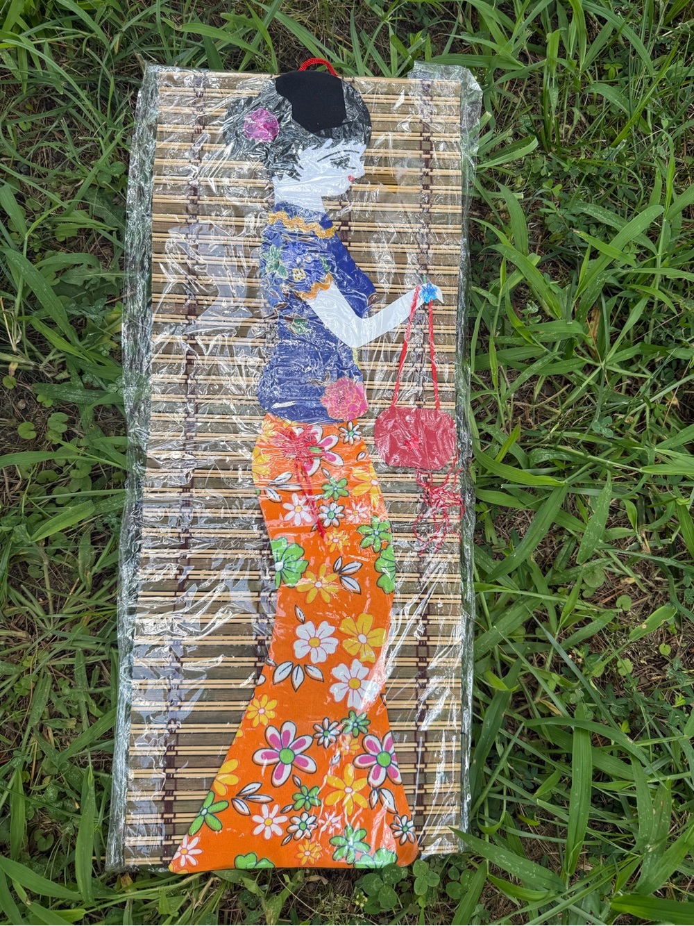 vintage Chinese fabric appliqué and slat bamboo wall hanging